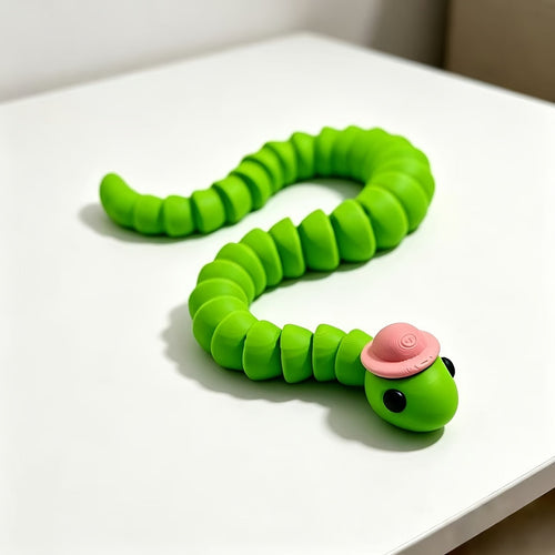 3D Printed Articulated Snake Figurine with Hat - image 2
