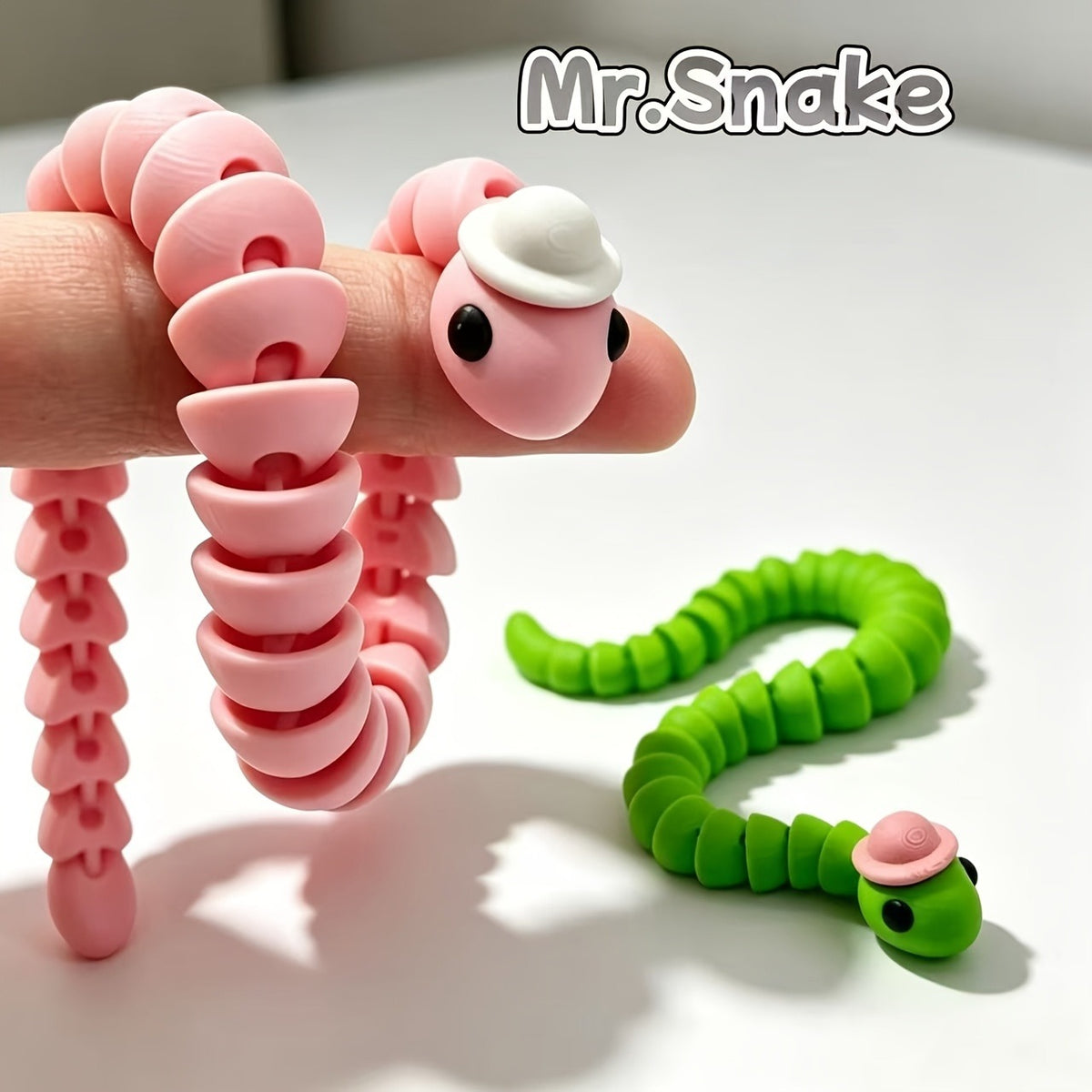 3D Printed Articulated Snake Figurine with Hat - image 5